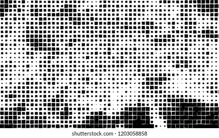 Abstract grunge texture of black squares on a white background