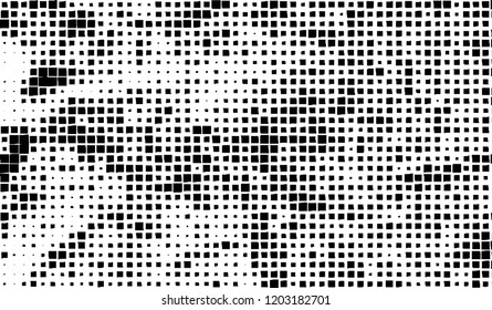 Abstract grunge texture of black squares on a white background