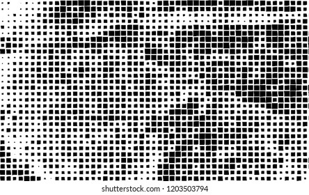 Abstract grunge texture of black squares on a white background