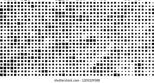 Abstract grunge texture of black squares on a white background