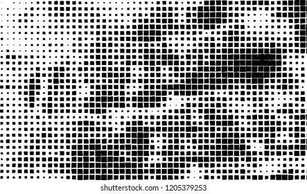 Abstract grunge texture of black squares on a white background