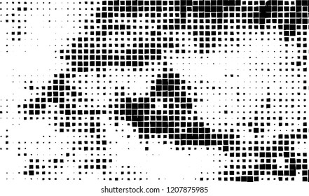 Abstract grunge texture of black squares on a white background