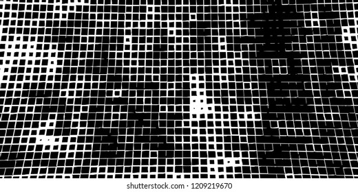 Abstract grunge texture of black squares on a white background