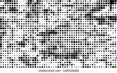 Abstract grunge texture of black squares on a white background