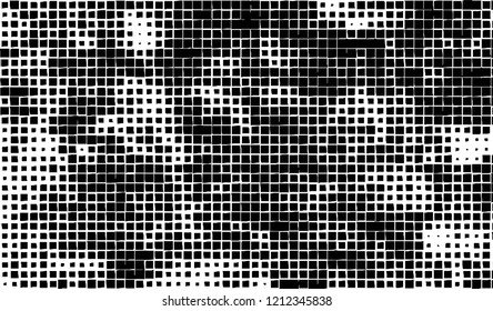 Abstract grunge texture of black squares on a white background