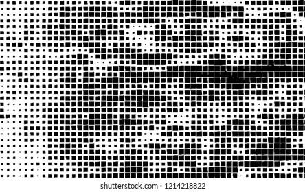Abstract grunge texture of black squares on a white background