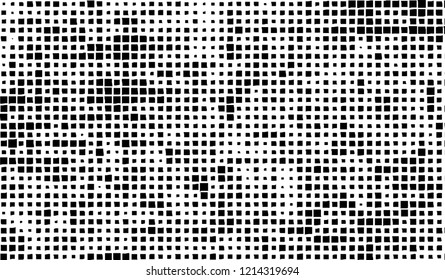 Abstract grunge texture of black squares on a white background