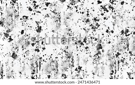 Abstract grunge texture design on a white background. Dirt texture for the background with stain and blood drop effect. Distressed texture background with black and white colors. Abstract dust texture