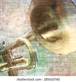 abstract grunge vintage music background with trumpet on gray