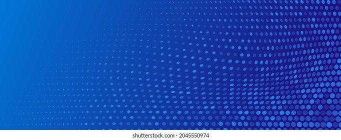 Abstract halftone background made of small round dots of different sizes in blue colors