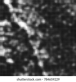 Abstract halftone background. Texture of dots of ink. Monochrome vector grunge pattern black and white