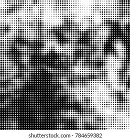 Abstract halftone background. Texture of dots of ink. Monochrome vector grunge pattern black and white