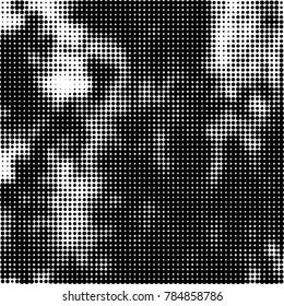 Abstract halftone background. Texture of dots of ink. Monochrome vector grunge pattern black and white