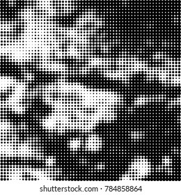 Abstract halftone background. Texture of dots of ink. Monochrome vector grunge pattern black and white