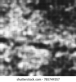 Abstract halftone background. Texture of dots of ink. Monochrome vector grunge pattern black and white