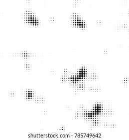 Abstract halftone background. Texture of dots of ink. Monochrome vector grunge pattern black and white
