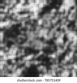 Abstract halftone background. Texture of dots of ink. Monochrome vector grunge pattern black and white