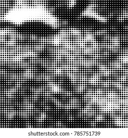 Abstract halftone background. Texture of dots of ink. Monochrome vector grunge pattern black and white