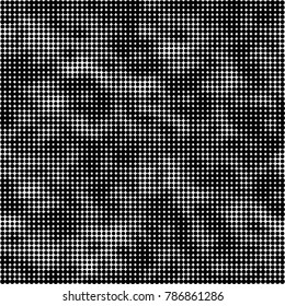 Abstract halftone background. Texture of dots of ink. Monochrome vector grunge pattern black and white