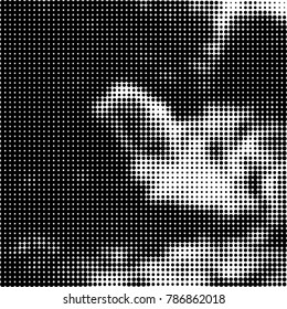 Abstract halftone background. Texture of dots of ink. Monochrome vector grunge pattern black and white