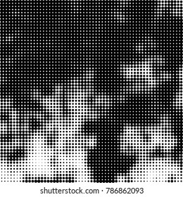 Abstract halftone background. Texture of dots of ink. Monochrome vector grunge pattern black and white