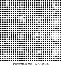Abstract halftone. Black dots on white background. Chaotic monochrome texture
