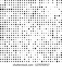 Abstract halftone. Black dots on white background. Chaotic monochrome texture