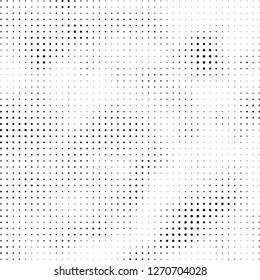 Abstract halftone. Black dots on white background. Chaotic monochrome texture