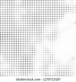Abstract halftone. Black dots on white background. Chaotic monochrome texture