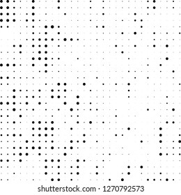 Abstract halftone. Black dots on white background. Chaotic monochrome texture
