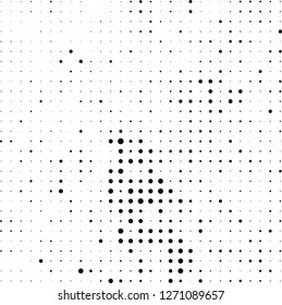 Abstract halftone. Black dots on white background. Chaotic monochrome texture