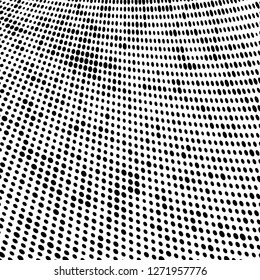 Abstract halftone. Black dots on white background. Chaotic monochrome texture