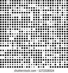Abstract halftone. Black dots on white background. Chaotic monochrome texture