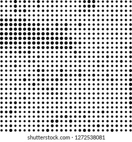Abstract halftone. Black dots on white background. Chaotic monochrome texture