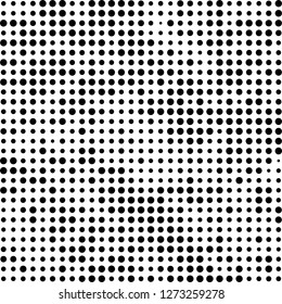 Abstract halftone. Black dots on white background. Chaotic monochrome texture