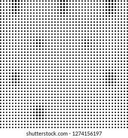 Abstract halftone. Black dots on white background. Chaotic monochrome texture