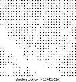 Abstract halftone. Black dots on white background. Chaotic monochrome texture
