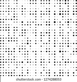 Abstract halftone. Black dots on white background. Chaotic monochrome texture