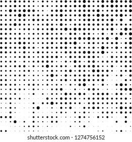 Abstract halftone. Black dots on white background. Chaotic monochrome texture