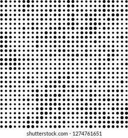 Abstract halftone. Black dots on white background. Chaotic monochrome texture