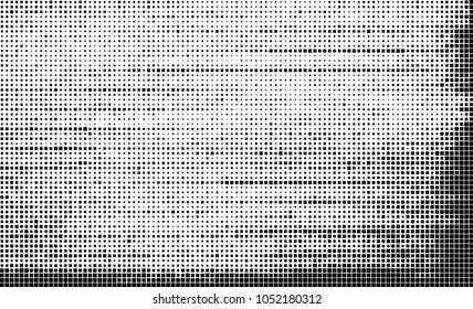Abstract halftone of black squares on a white background