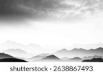 Abstract halftone landscape of mountains and misty valleys in black and white, trees and hills in dotted halftone.