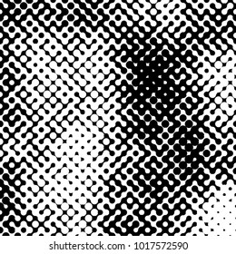 Abstract halftone pattern formed by black and white circles of different size.Vector illustration of a dotted background