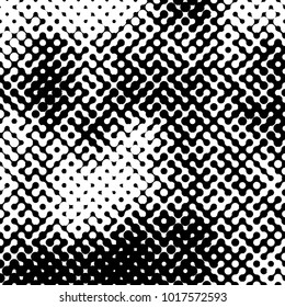 Abstract halftone pattern formed by black and white circles of different size.Vector illustration of a dotted background