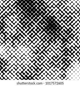 Abstract halftone pattern formed by black and white circles of different size.Vector illustration of a dotted background