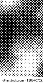 Abstract halftone pattern formed by black and white circles of different size.Vector illustration of a dotted background.