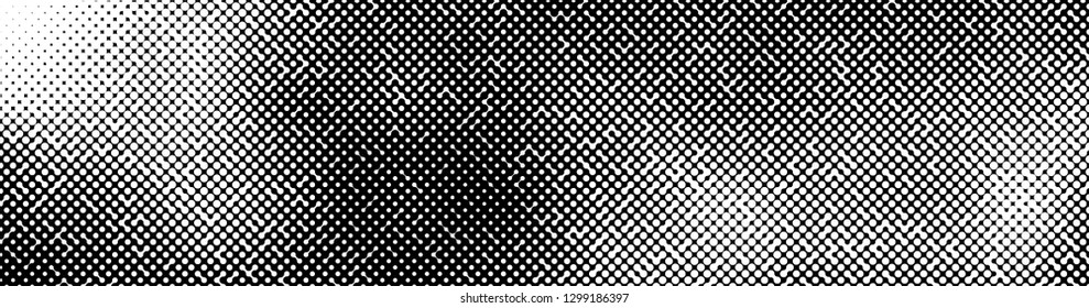Abstract halftone pattern formed by black and white circles of different size.Vector illustration of a dotted background