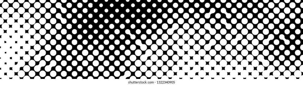 Abstract halftone pattern formed by black and white circles of different size.Vector illustration of a dotted background.
