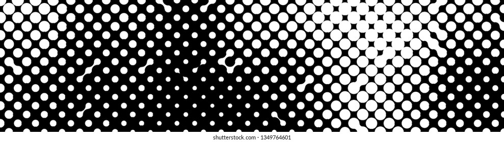 Abstract halftone pattern formed by black and white circles of different size.Vector illustration of a dotted background.
