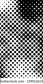 Abstract halftone pattern formed by black and white circles of different size.Vector illustration of a dotted background.